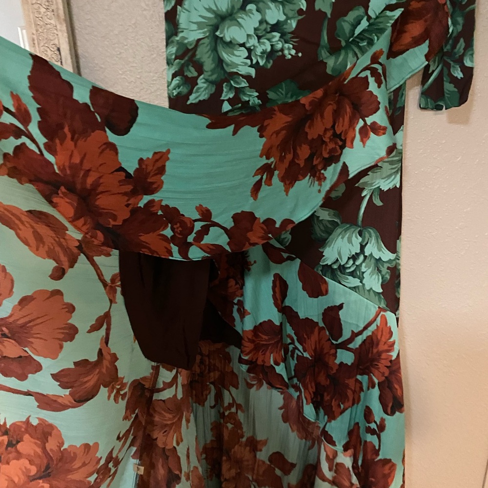 Beautiful floral high/low ruffle wrap skirt.